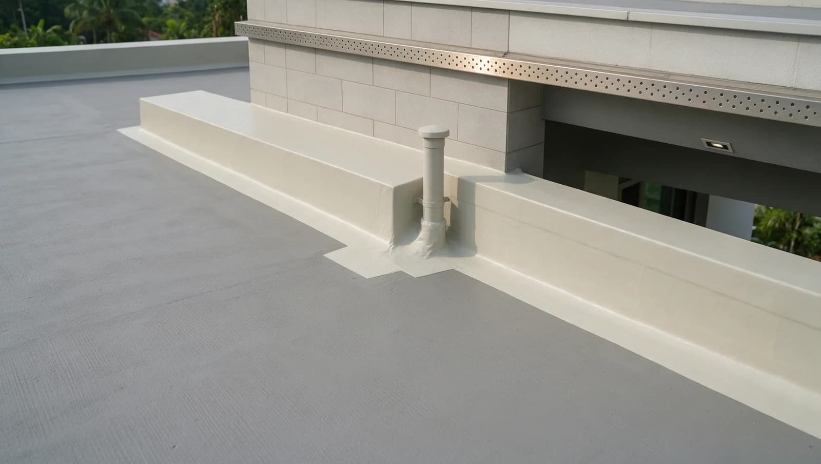 Coated roof junction surrounding an upstand and a vertical pipe